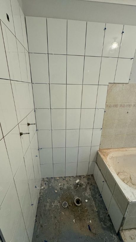 Plumbing , waterproofing and tilling done