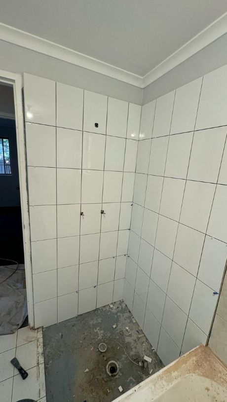 Plumbing , waterproofing and tilling done